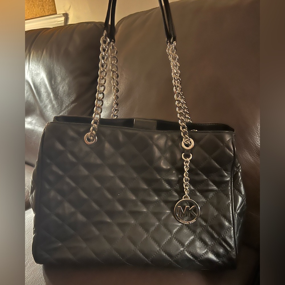 Micheal Kors, black leather large tote with silver trim, never used with tags